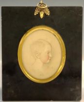 A Georgian oval miniature, the head of a young child