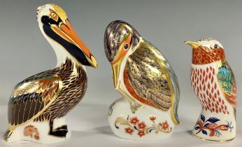 A Royal Crown Derby paperweight, Brown Pelican, gold stopper; others, Kingfisher, silver stopper;