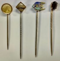 A Blue John stickpin; horse head; enamel fish; garnet (4)