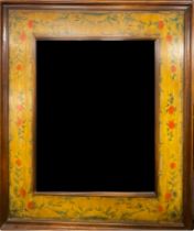 Interior Design - a large rectangular looking glass, the wide wooden framed decorated in the Folk