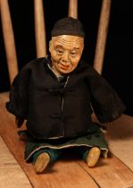 An early 20th century Chinese Door of Hope Mission 'Uncle' doll, the painted papier-mâché head