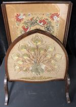 A 19th century mahogany rectangular needlework and beadwork fire screen, decorated with scrolling