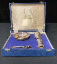 A Mappin and Webb silver plated Christening set, decorated with rabbits