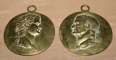 A pair of Grand Tour portrait plaques, cast in relief with profile relief busts of Claudius and
