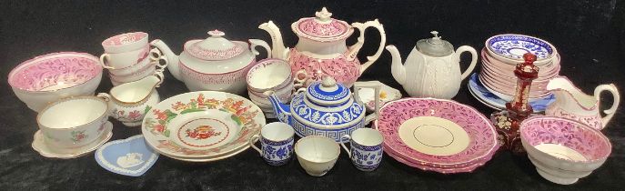 A mid 19th century lustre tea service for six, comprising teapot, slop bowl, sugar bowl, cups and