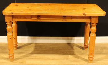 A pine farmhouse kitchen table, 75.5cm high, 137cm wide, 67cm deep