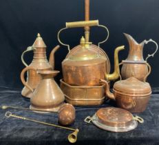 A large copper and brass kettle; a copper warming pan; a copper quart flagon; an Eastern style