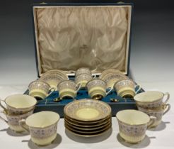 A set of six Royal Worcester Lady Evelyn pattern tea cups and saucers, the fitted case with six