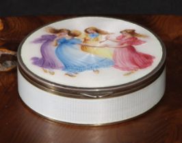 An early 20th century Continental silver and enamel circular table snuff box, hinged cover decorated