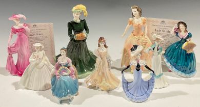 A Coalport figure, Barbara, seated with a fan, 12cm; other Coalport figures, Breeze, Harmony, Emma