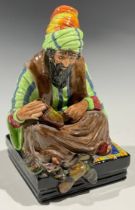 A Royal Doulton figure, The Cobbler, HN 1706, 20cm, printed marks in green, 20cm high