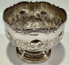 A late Victorian silver pedestal bowl, stop fluted with a band of scrolling acanthus, moulded scroll