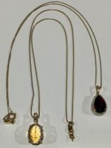 A 9ct gold necklace with citrine pendant, marked 375, 5.7g; a 9ct gold necklace with 9ct gold