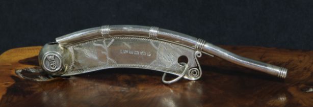 A Victorian silver boatswain's whistle or call, chased with wriggle work, 13cm long, Birmingham