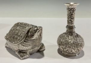 A Cambodian silver coloured metal betel box, as a turtle, 9.5cm long; an Indian silver coloured