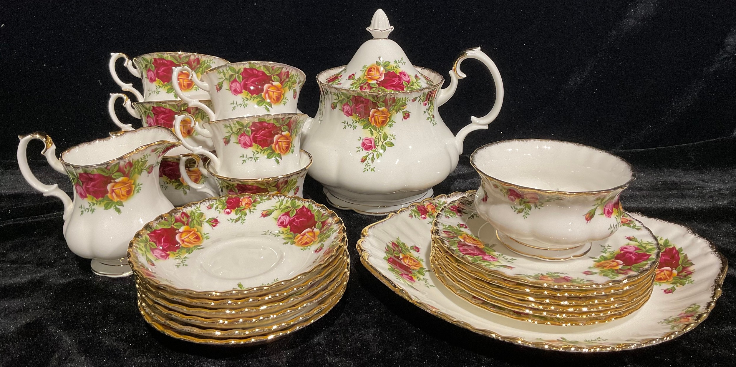 A Royal Albert Old Country Roses pattern tea service, for six, comprising teapot, cream jug, sugar