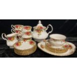 A Royal Albert Old Country Roses pattern tea service, for six, comprising teapot, cream jug, sugar