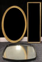 An oval gilt framed mirror, 95cm x 68cm; another, rectangular, 106cm x 34cm; another (3)