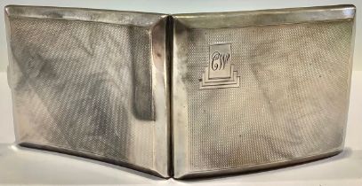 A silver cigarette case, the interior inscribed 'Presented To Clement Warner Esq., as a mark of