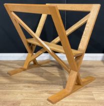 An oak folio stand, 96cm wide, 77cm deep