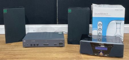 A NAD Electronics 3020i stereo amplifier; a pair of Wharfedale Delta 30 speakers; Harman Kardon