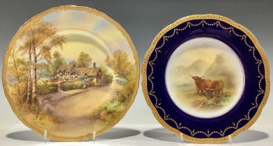 A Royal Worcester named view cabinet plate, printed and painted with Anne Hathaway's Cottage, signed