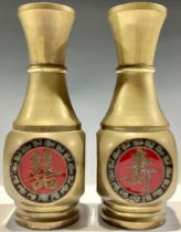 A pair of Chinese brass vases, each panel enamelled in red and black with character marks, 21cm