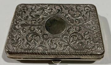 An Indian silver rectangular cigarette case, 8cm long, 92g gross