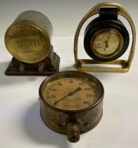 A Horstman time controller; a pressure gauge; a horse stirrup thermometer