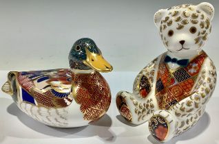 A Royal Crown Derby paperweight, Blue Bow Tie Teddy Bear, in Imari waistcoat, gold stopper; another,