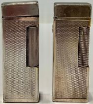 A Dunhill silver plated cigarette lighter; another (2)