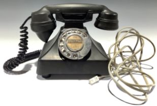A Dictomatic dial-up telephone