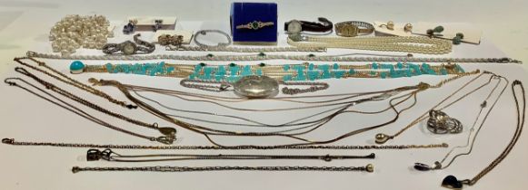 A mid 20th century oval locket, fancy link chain; a faux pearl necklace; earrings; etc (quantity)