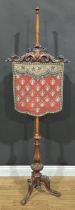 An elaborate Victorian pole screen, with beadwork panel