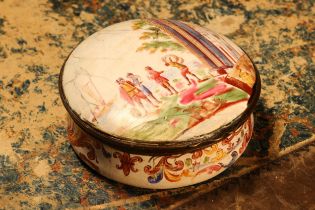A George III South Staffordshire enamel circular table snuff box, hinged cover painted with