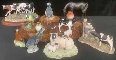 A collection of Beswick bird models, on stand; a Beswick model, of a calf; a Border Fine Arts model,