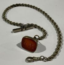 A Victorian Albert with large carnelian monogrammed fob