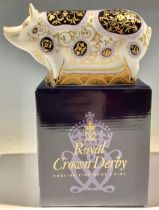 A Royal Crown Derby paperweight, Spotty Pig, visitor centre exclusive, limited edition of 1500, gold