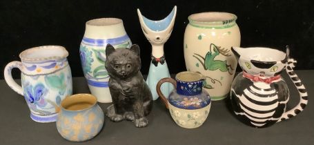 Decorative Ceramics - a Bretby black cat; Italian stylised vase in the form of a cat; another, as