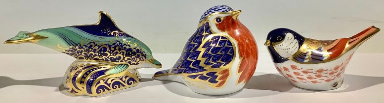 A Royal Crown Derby paperweight, Baby Bottlenose Dolphin, gold stopper; others Robin, gold