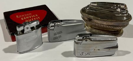 A Ronson table lighter; three other Ronson lighters (4)