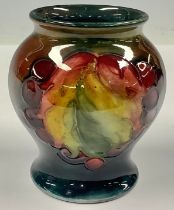 A Moorcroft Flambe Leaf & Berry pattern ovoid vase, 8cm high, impressed marks