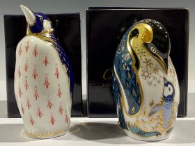A Royal Crown Derby paperweight, Penguin and Chick, gold stopper, boxed; another, Penguin, gold