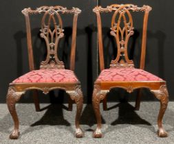 A pair of Chippendale Revival mahogany dining chairs, 100cm high, 57.5cm wide, 45cm seat depth
