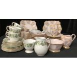 A Wedgwood Santa Clara part tea service comprising teapot, cake plate, side plates, cream jug,
