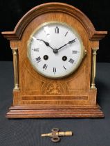 An Edwardian oak and marquetry classical revival mantle clock, 8-day movement striking on a gong,