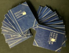 UK twentieth century coins – fourteen collectors’ pre-printed blue card folders 15 x 19mm average