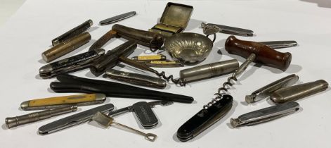 A collection of penknives, corkscrews, pocket tool kits, etc