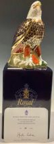A Royal Crown Derby paperweight, Bald Eagle, commissioned by Harrods, limited edition 44/300, gold