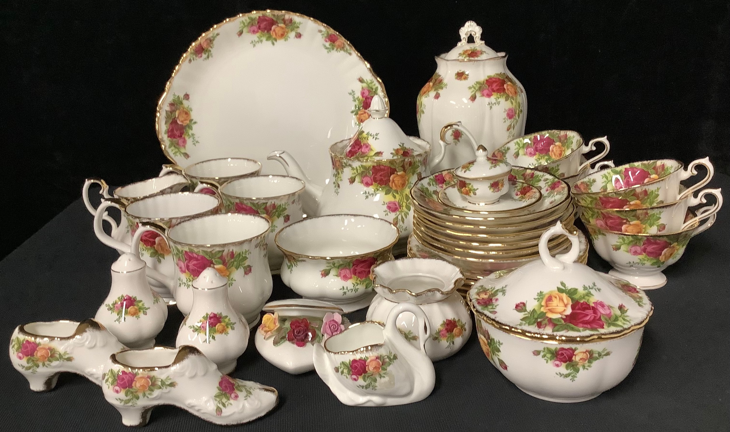 A Royal Albert Old Country Roses pattern teapot, six teacups, saucers and tea plates, sandwich